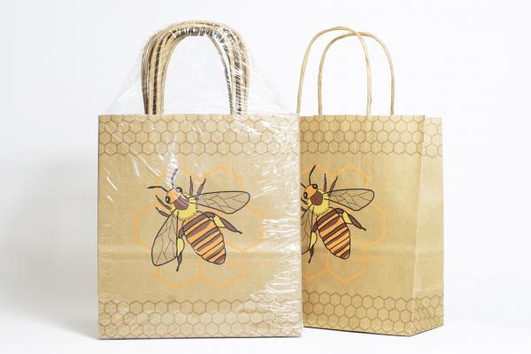 Papieren draagtasjes met bijenopdruk per 10 - 31cm diep